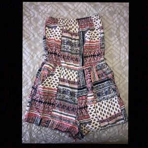 A multi pattern romper.